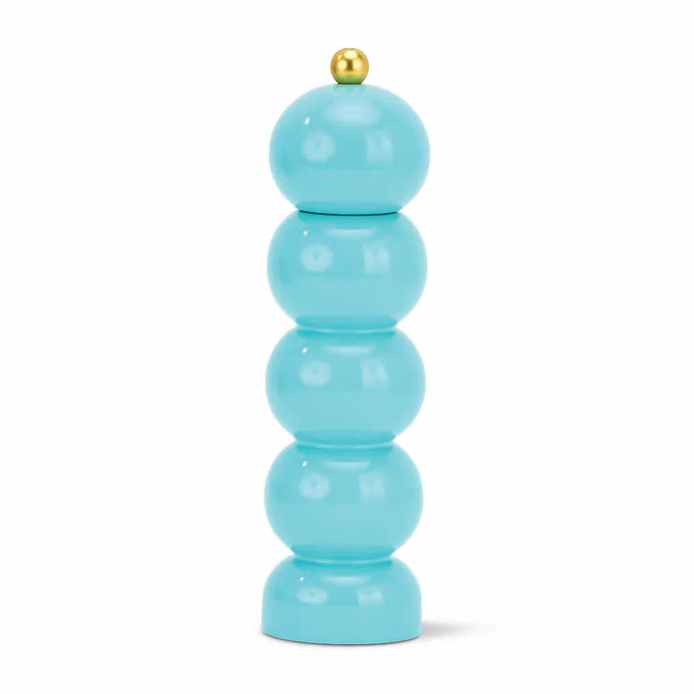 Turquoise cylindrical object with a gold top on a white background