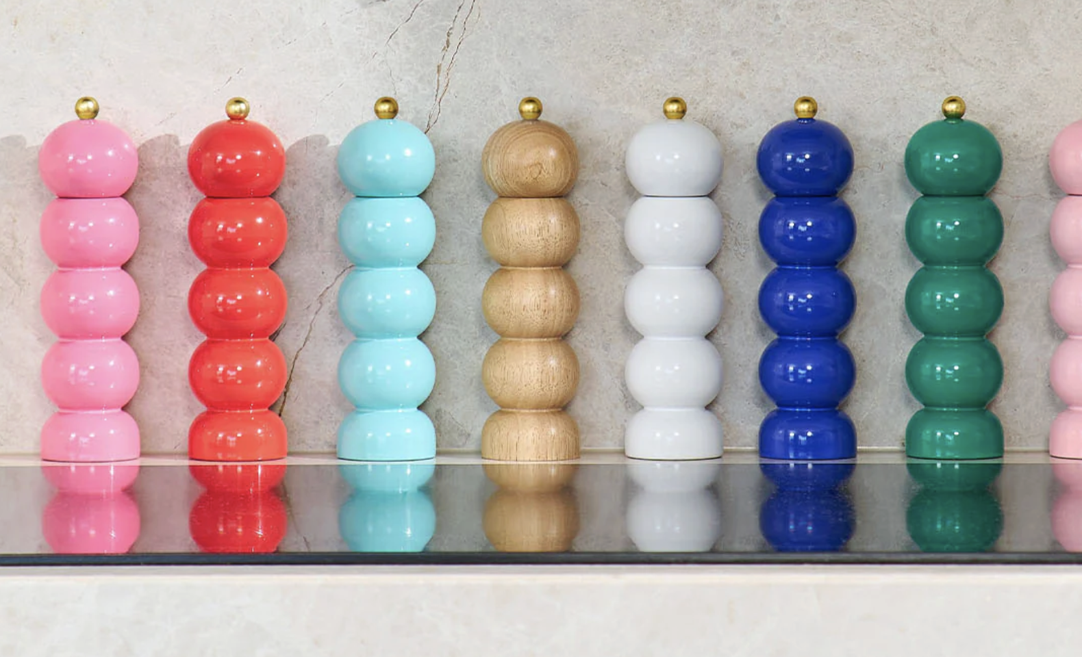 Colorful wooden salt and pepper grinders