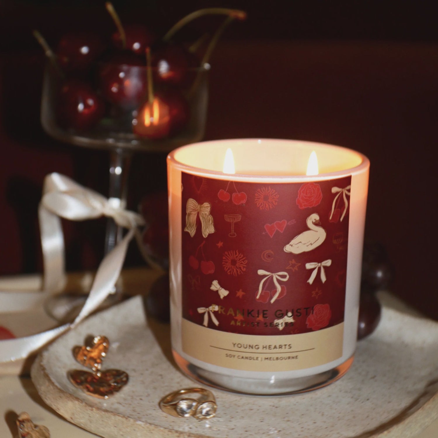 Candle with decorative label from Frankie Gusti, inspired by cherries
