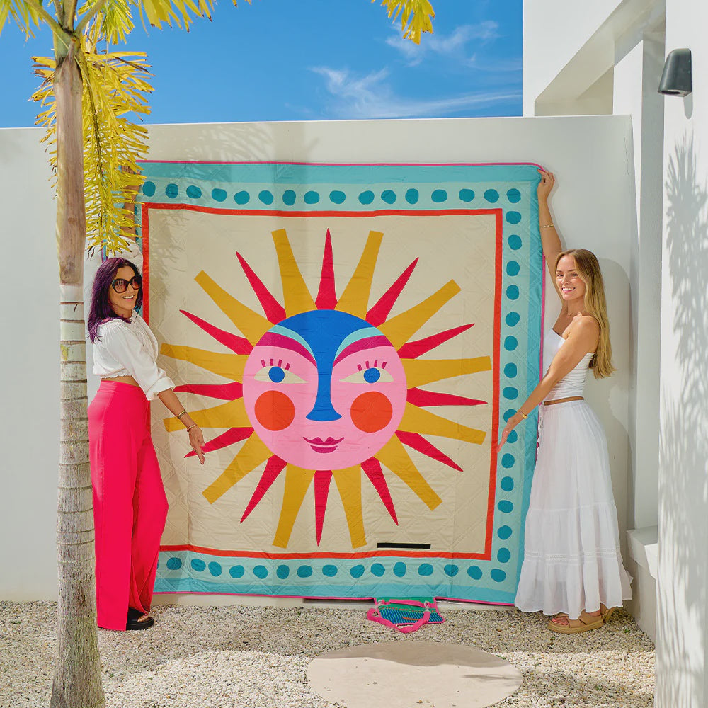 a colorful sun-themed picnic for outdoor use.