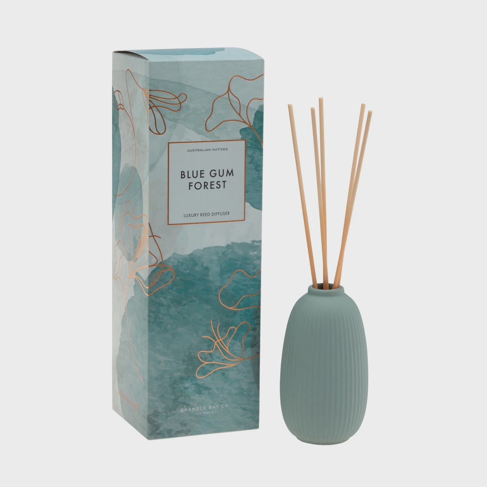 Blue gum forest diffuser with packaging on a white background inspired by Blue Gums